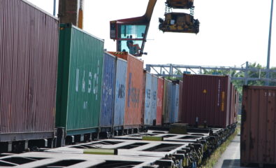 Rail freight wagons being loaded at a freight yard